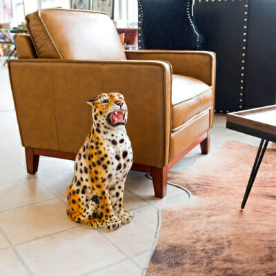 Porcelain Sitting Leopard Cub Statue in our Showroom