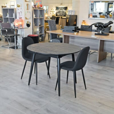 Thornton extending black dining table in our showroom